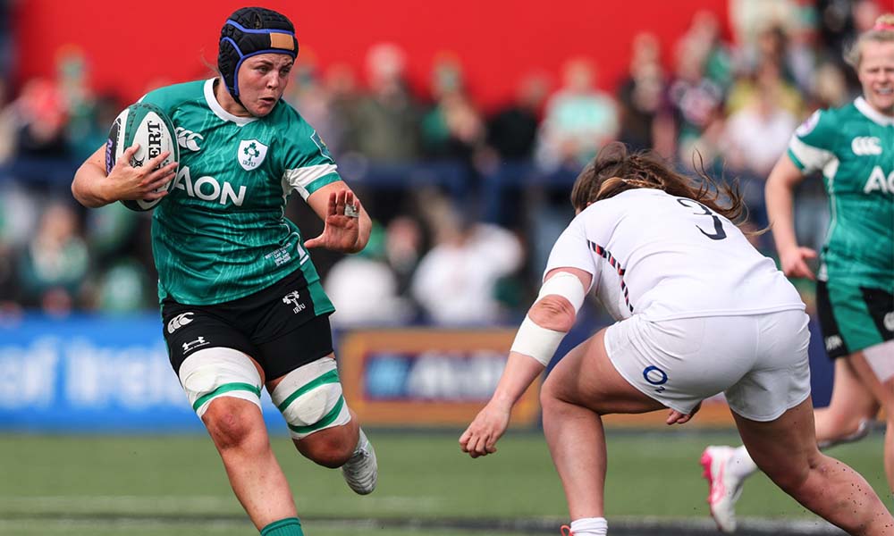 Brittany Hogan avoiding a tackle